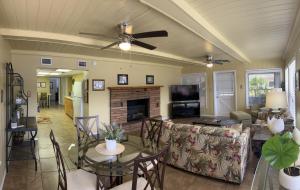 a living room with a couch and a fireplace at Hontoon Landing Resort & Marina in DeLand