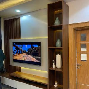 A television and/or entertainment centre at The Vistana Riverside 2Bedroom Apartment