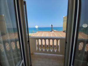 a view of the ocean from a balcony at Al Giglio - Bed and Breakfast in Cariati