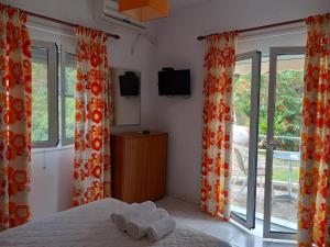 Postel nebo postele na pokoji v ubytování Potokia Rooms