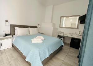Cama ou camas em um quarto em Villa Oceania