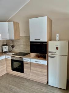 Kuchyňa alebo kuchynka v ubytovaní Moonlight Apartment