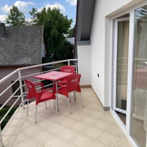 Rõdu või terrass majutusasutuses Pizza Sztori Apartman