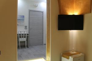 TV a/nebo společenská místnost v ubytování B&B Lizia