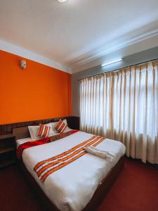 Tempat tidur dalam kamar di Mountain Resort