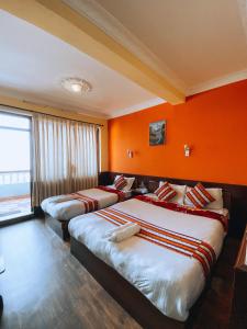 Tempat tidur dalam kamar di Mountain Resort