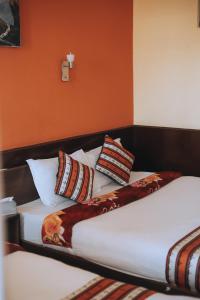 Tempat tidur dalam kamar di Mountain Resort