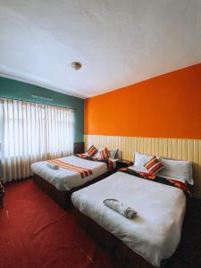 Tempat tidur dalam kamar di Mountain Resort