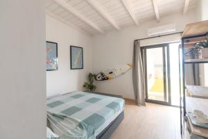Voodi või voodid majutusasutuse New Rooftop Gem with stunning Oceanview toas