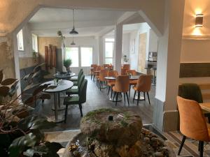A restaurant or other place to eat at APARTMANI & RESTORAN -S O K O- SJENICA