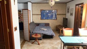 Posteľ alebo postele v izbe v ubytovaní La Casita de Descanso - Das Häuschen der Ruhe - La Luz - La Orotava