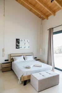 Posteľ alebo postele v izbe v ubytovaní Tempestini Exclusive Villas + 37 fotografií