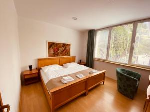 Posteľ alebo postele v izbe v ubytovaní hotel ADRIA