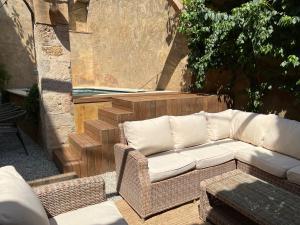 Posedenie v ubytovaní Can Met Mosso, Casa rural con Piscina Climatizada