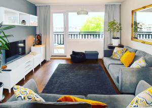 Posezení v ubytování Bansko Royal Towers Apartments - Gondola View + 18 fotografií