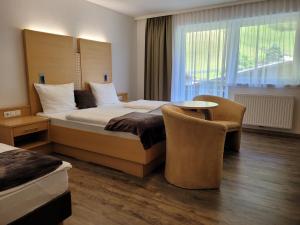 Postel nebo postele na pokoji v ubytování Hotel-Restaurant Lampenhäusl