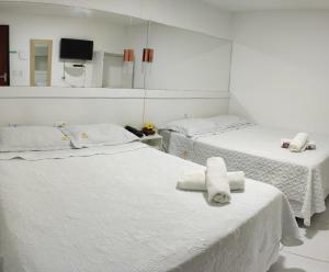 Postel nebo postele na pokoji v ubytování Pousada dos Cabanos