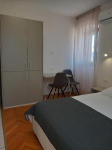 Postel nebo postele na pokoji v ubytování Marjan apartment & rooms