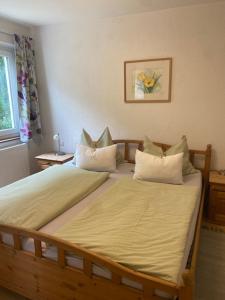 Posteľ alebo postele v izbe v ubytovaní Garten Apartment Diwoky