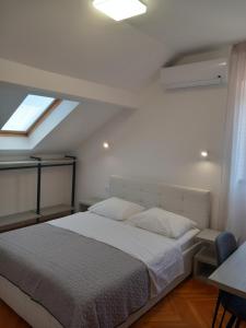 Postel nebo postele na pokoji v ubytování Marjan apartment & rooms
