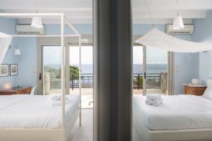 Posteľ alebo postele v izbe v ubytovaní Seaside Home Crete - Dream Oceanfront Getaway