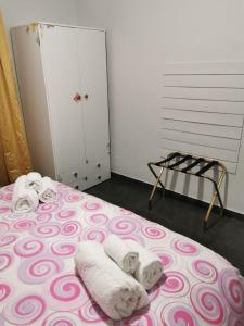 Posteľ alebo postele v izbe v ubytovaní Mq 36 Bilo Marsala City Center "NO ZTL"