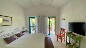 Ένα ή περισσότερα κρεβάτια σε δωμάτιο στο Kasa Karapató +39 φωτογραφίες