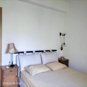 A bed or beds in a room at Villas On The Rock Afissos