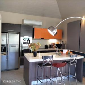 A kitchen or kitchenette at Villas On The Rock Afissos