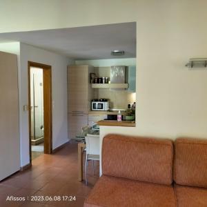 A kitchen or kitchenette at Villas On The Rock Afissos