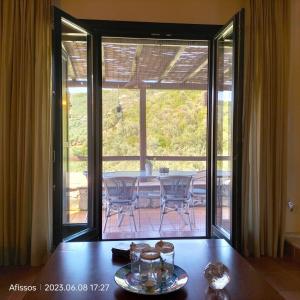 A balcony or terrace at Villas On The Rock Afissos