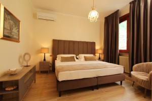 Postel nebo postele na pokoji v ubytování VillaMara Luxury rooms