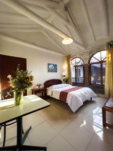 Voodi või voodid majutusasutuse Hotel Cusco Plaza Saphi toas