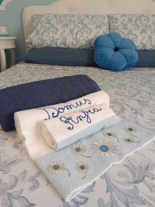 Postel nebo postele na pokoji v ubytování B&B Domus Anfra