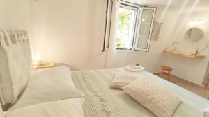 Postel nebo postele na pokoji v ubytování Myrtus Guest House