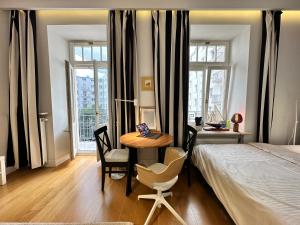 Ένα ή περισσότερα κρεβάτια σε δωμάτιο στο DECOR 4 fast WiFi 85'TV Netflix HBO Disney+