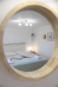Postel nebo postele na pokoji v ubytování Myrtus Guest House