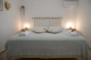 Postel nebo postele na pokoji v ubytování Myrtus Guest House