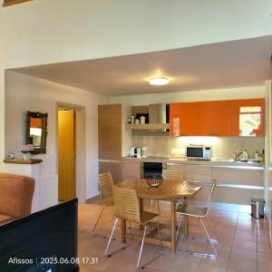 A kitchen or kitchenette at Villas On The Rock Afissos