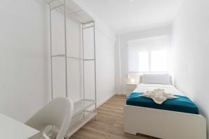 Postel nebo postele na pokoji v ubytování Pedrera 1 Tarragonastay