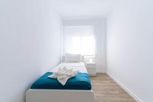 Postel nebo postele na pokoji v ubytování Pedrera 1 Tarragonastay