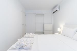 Postel nebo postele na pokoji v ubytování Pedrera 1 Tarragonastay