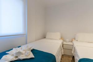 Postel nebo postele na pokoji v ubytování Pedrera 1 Tarragonastay