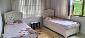 Een bed of bedden in een kamer bij Kemer konak