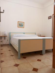 a bedroom with a bed in a room at Villetta Panoramica in Ischia