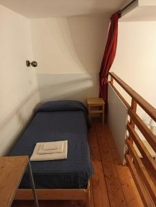 Posteľ alebo postele v izbe v ubytovaní Il Castello Apartment