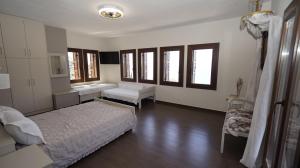 Llit o llits en una habitació de Villa Faihs