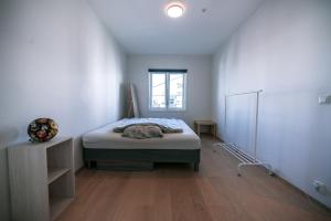 Кровать или кровати в номере Utsiktsleilighet i Bydel Bjerke