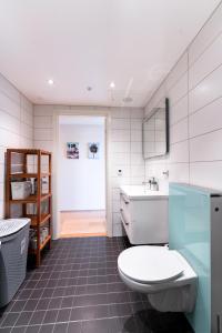 Ванная комната в Utsiktsleilighet i Bydel Bjerke
