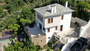 an aerial view of a white house at Villa Faihs in Afissos